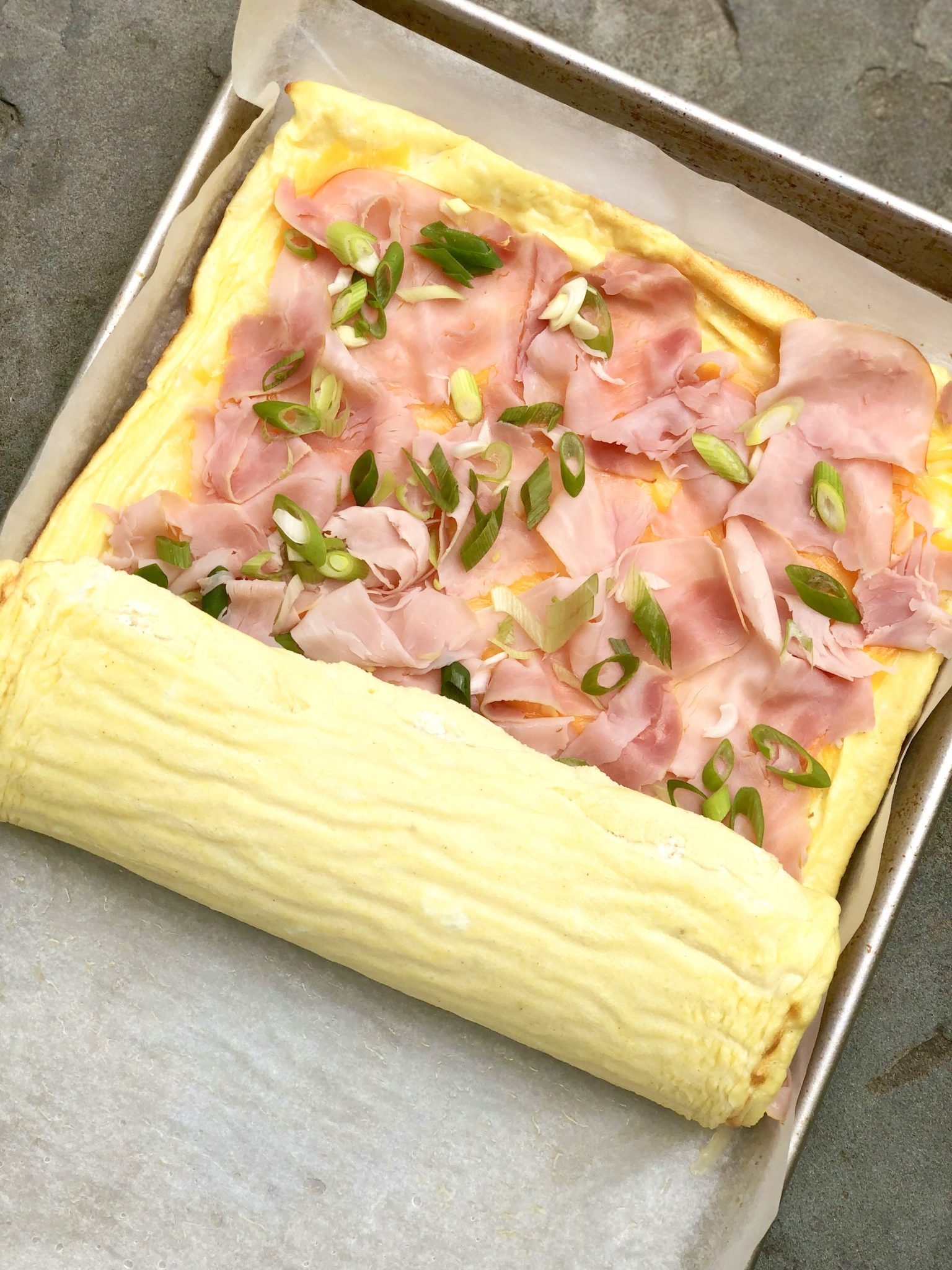 Omelet Roll-Perfect for holidays, special brunches and breakfast for dinner, this festive roll offers a fuss-free alternative to making omelets for a crowd.